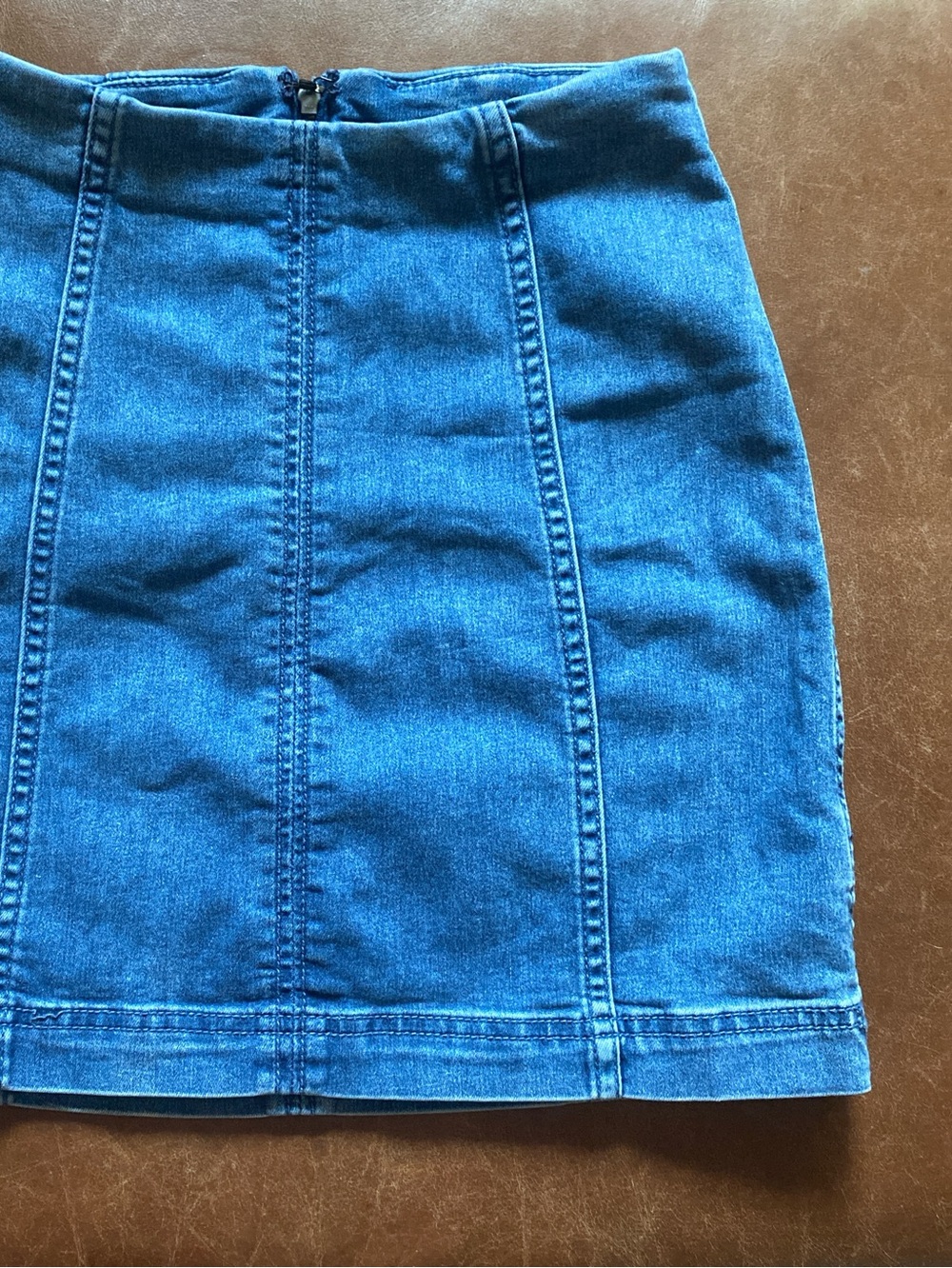 Free People medium wash denim mini skirt. Size 2.